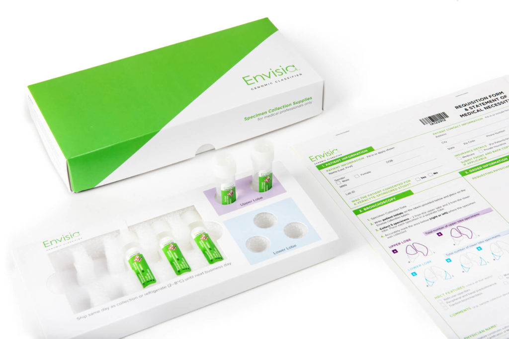 Photo of the Envisia Sample collection kit, with a box, multiple collection tubes, and an order form.